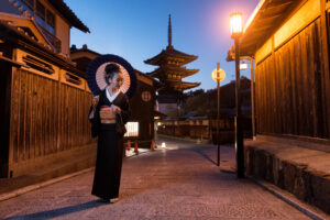 asian woman with kimono walking at yasaka pagoda in kyoto